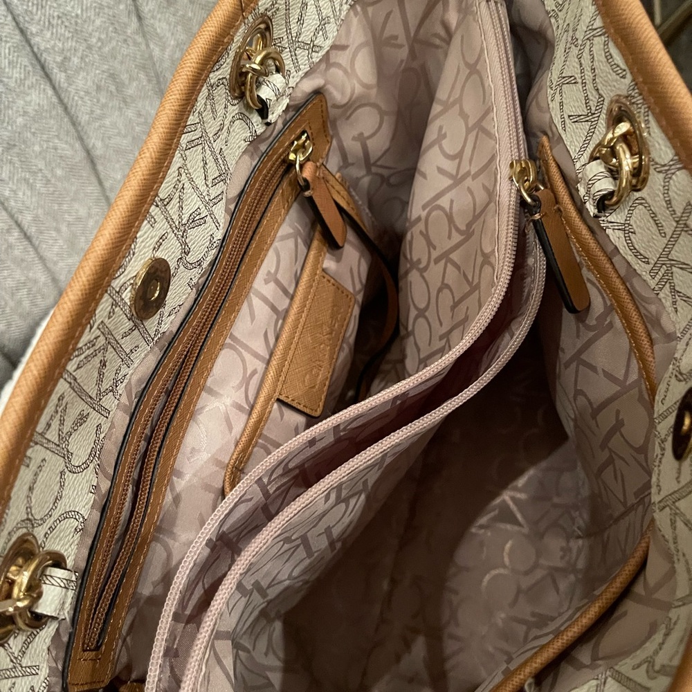 Calvin Klein bag ( please see picture of strap/ flaw)